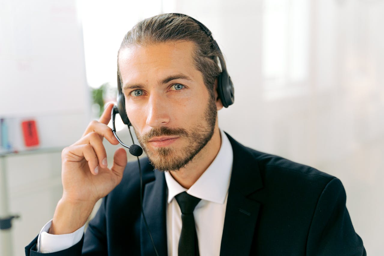 A man wearing a headset with a built-in microphone