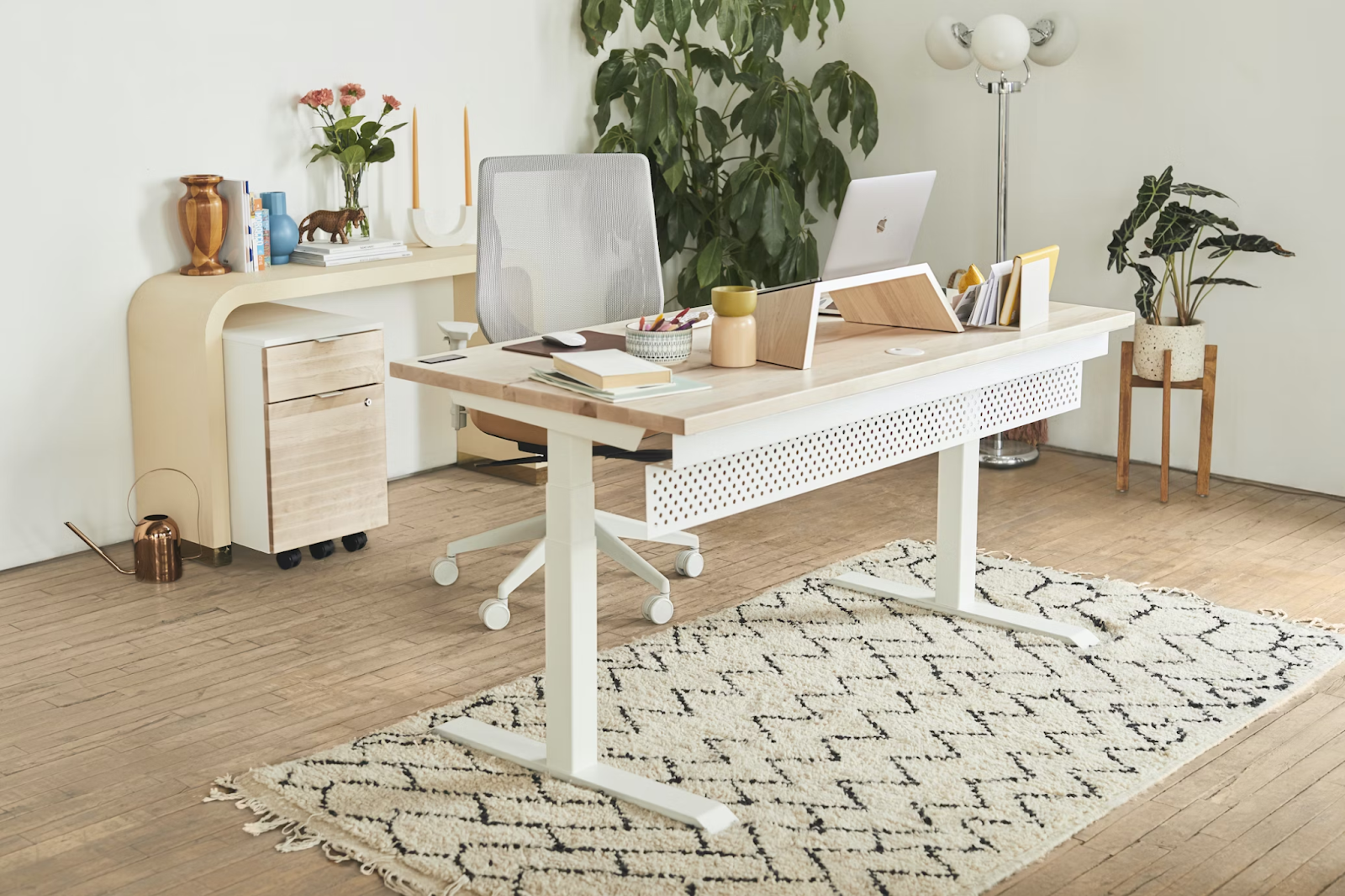 Well-appointed office desk with AV equipment.
